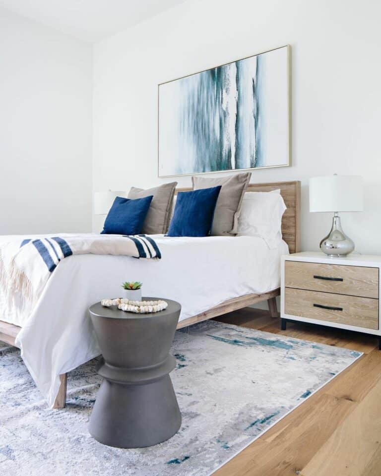 Blue-toned Bedroom With Ash Wood Bed