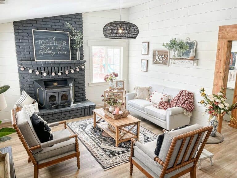 Boho Farmhouse Living Room With Black Fireplace