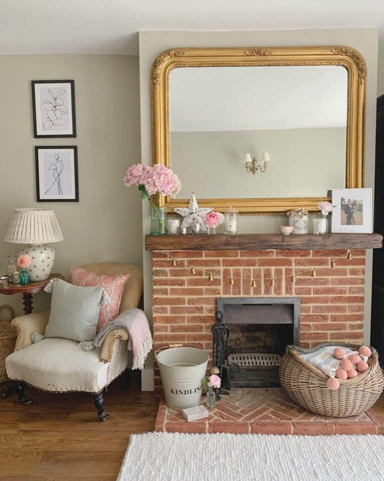 Brick Fireplace Beneath a Brass Mirror