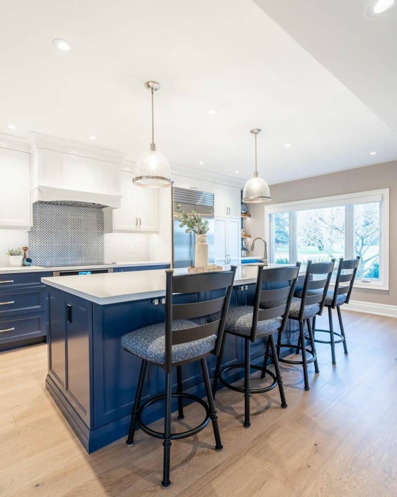 Brightly Lit Kitchen With Navy-blue Cabinets