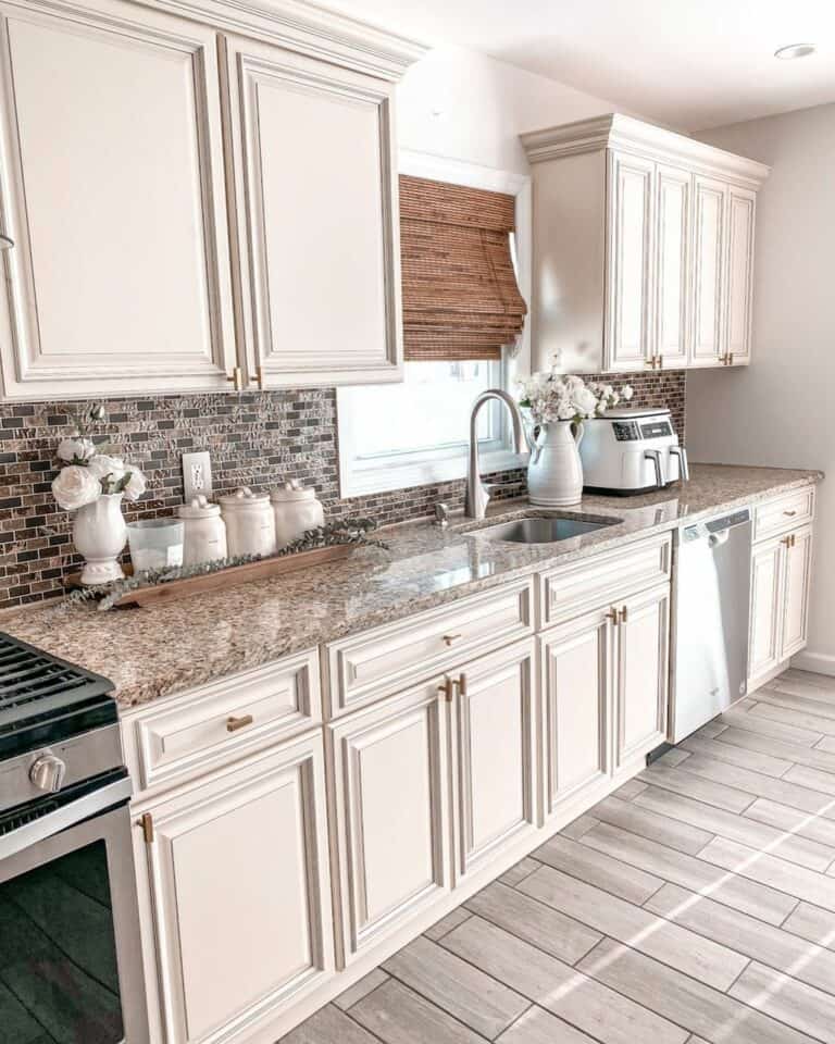 Brown Countertop Against Brick Backsplash