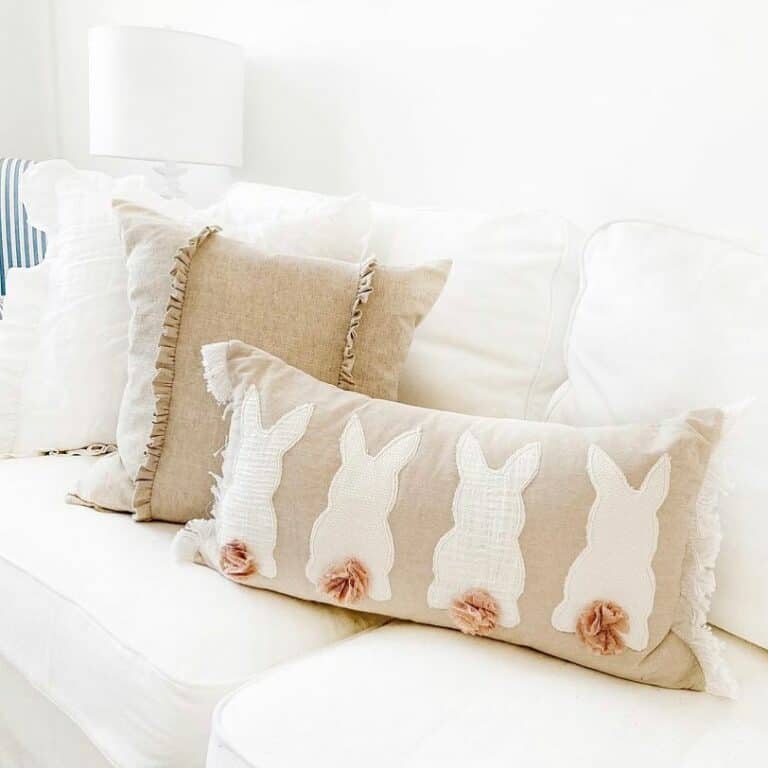 Brown Rabbit Bolster on a White Sofa