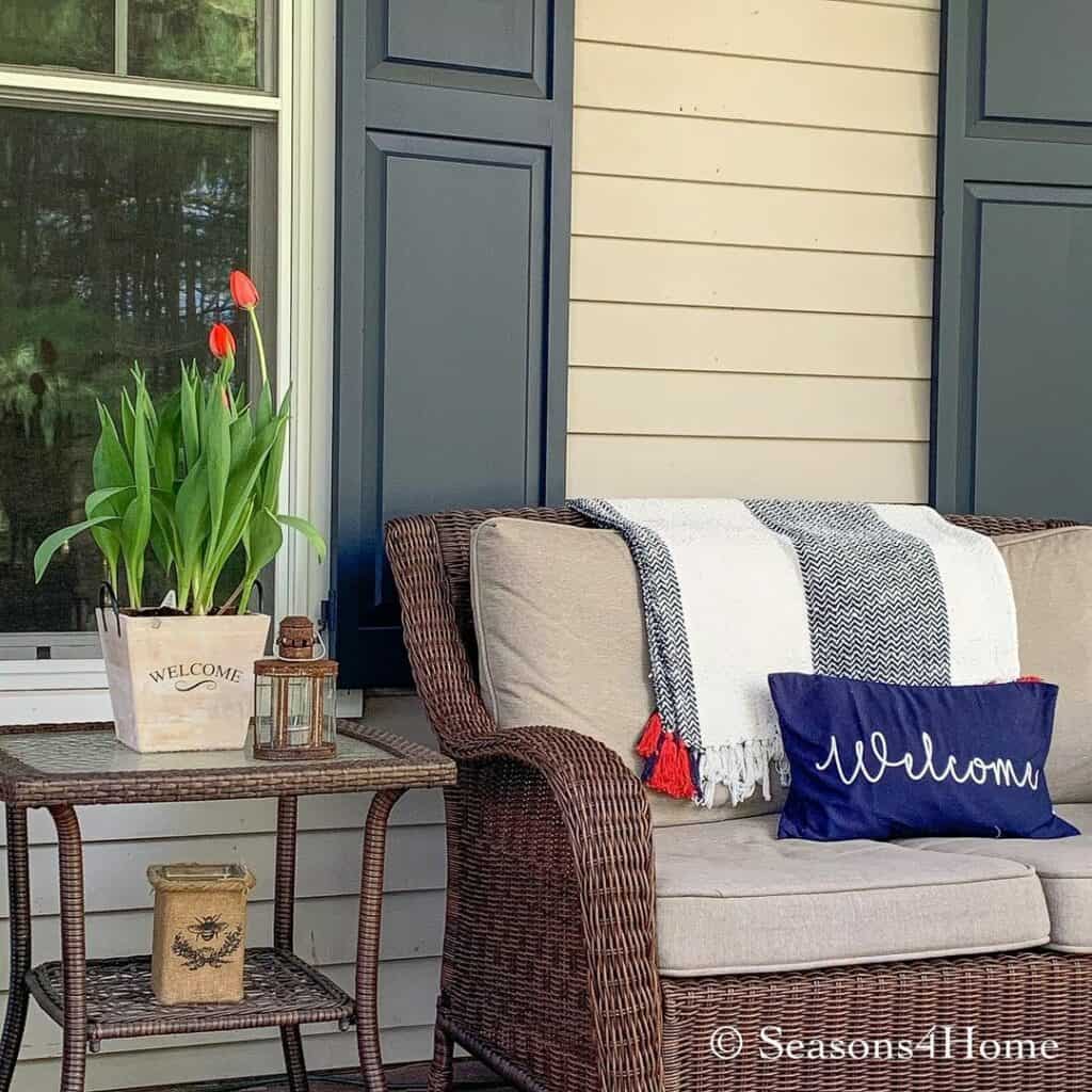 Brown Wicker End Table With Spring Décor