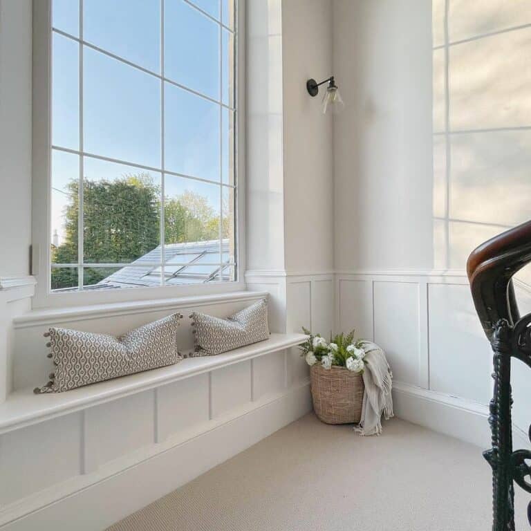 Built-in Window Seat for a White Living Room