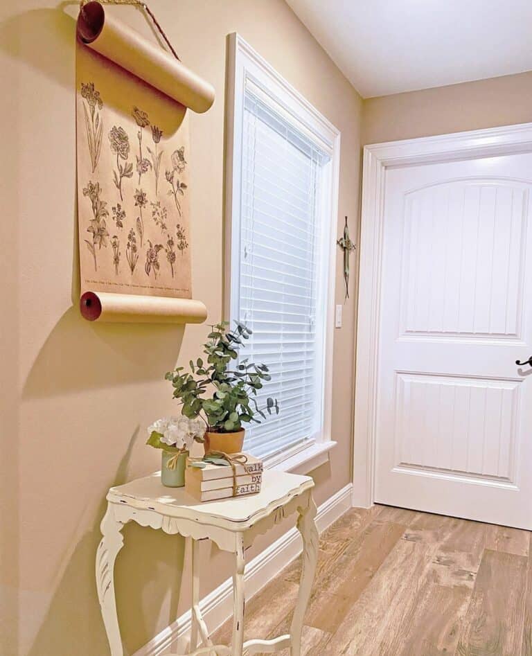 Charming Hallway With Scroll Wall Décor