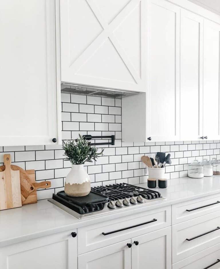 Clean White Kitchen With Subway Tiles