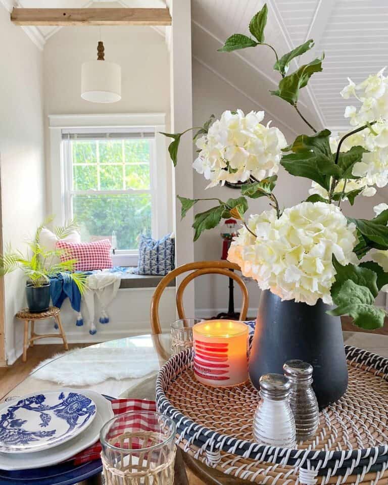 Compact Window Bench Beneath Shaded Pendant