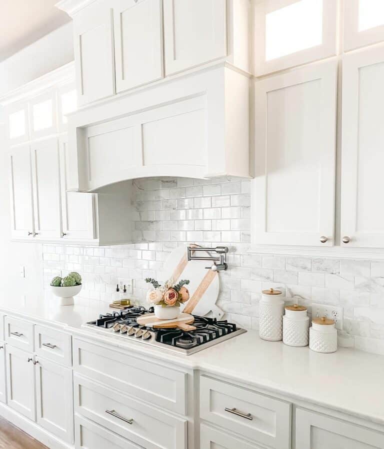 Cottage-style White Kitchen With White Subway Tile Backsplash