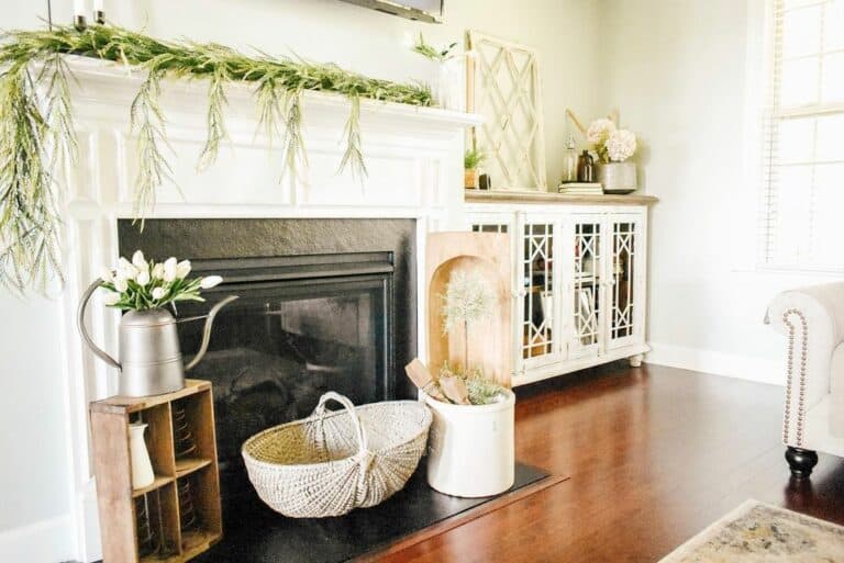 Cozy Fireplace Scene With Greenery