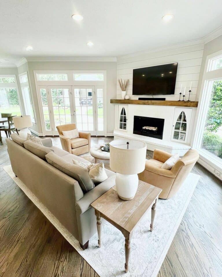 Cozy Living Room With White Fireplace