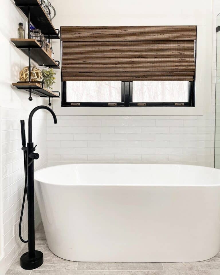 Dark Brown Bamboo Shade Over a White Tile Bathroom
