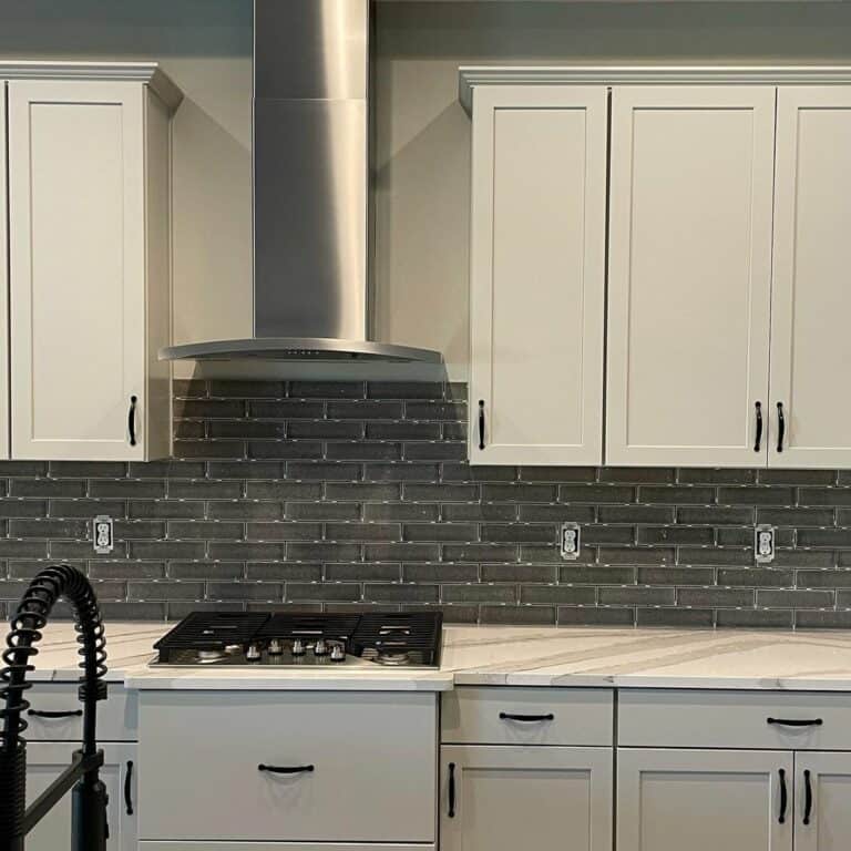 Dark Gray Tile and Black Cabinet Hardware
