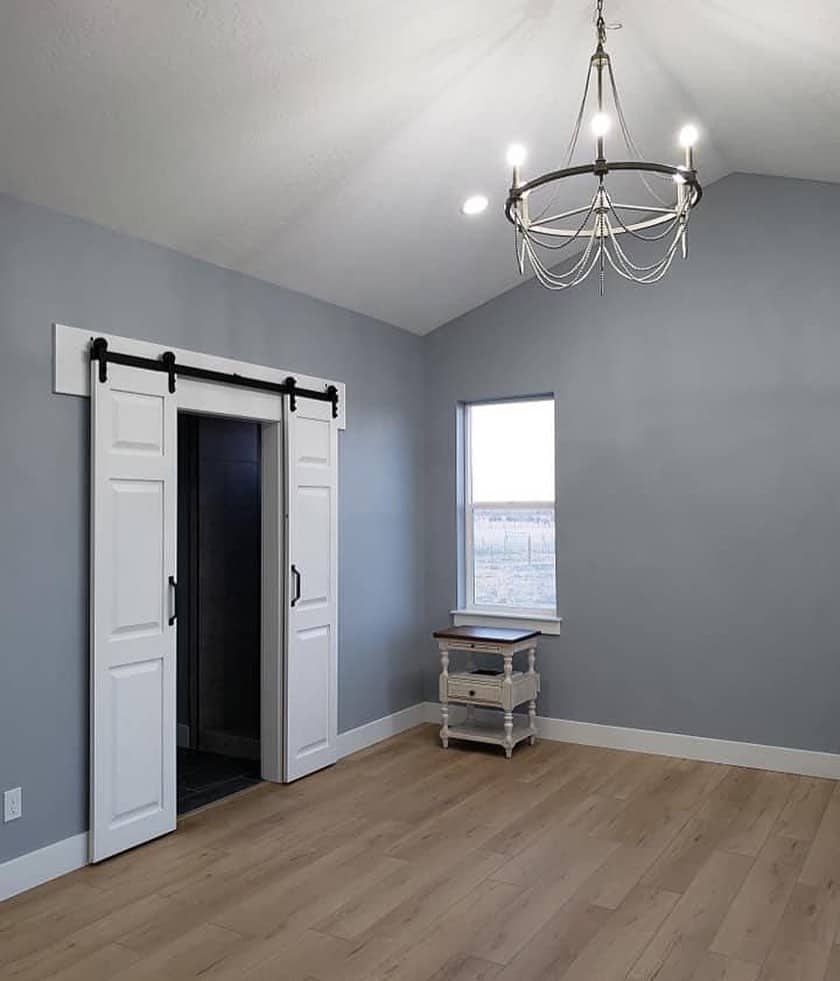 Double barn doors installed on bedroom entrance soul lane