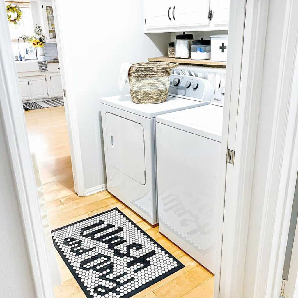 Double Entrance Laundry Room With Wood Flooring