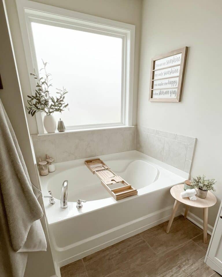 Earth-toned Bathroom With White Alcove Bathtub