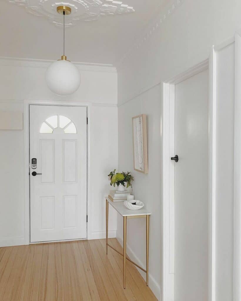 Embellished Ceiling Medallion and Brass Accents