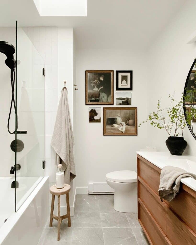 Enchanting Farmhouse Bathroom With Framed Artwork