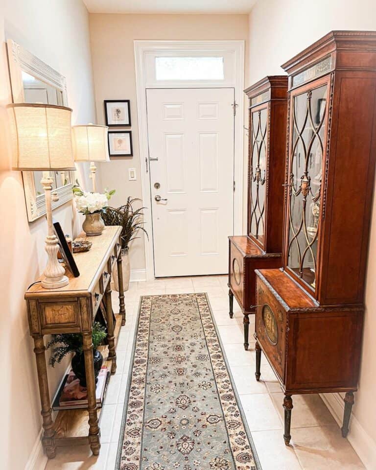 Entrance Hallway With Antique Wood Curio Cabinets