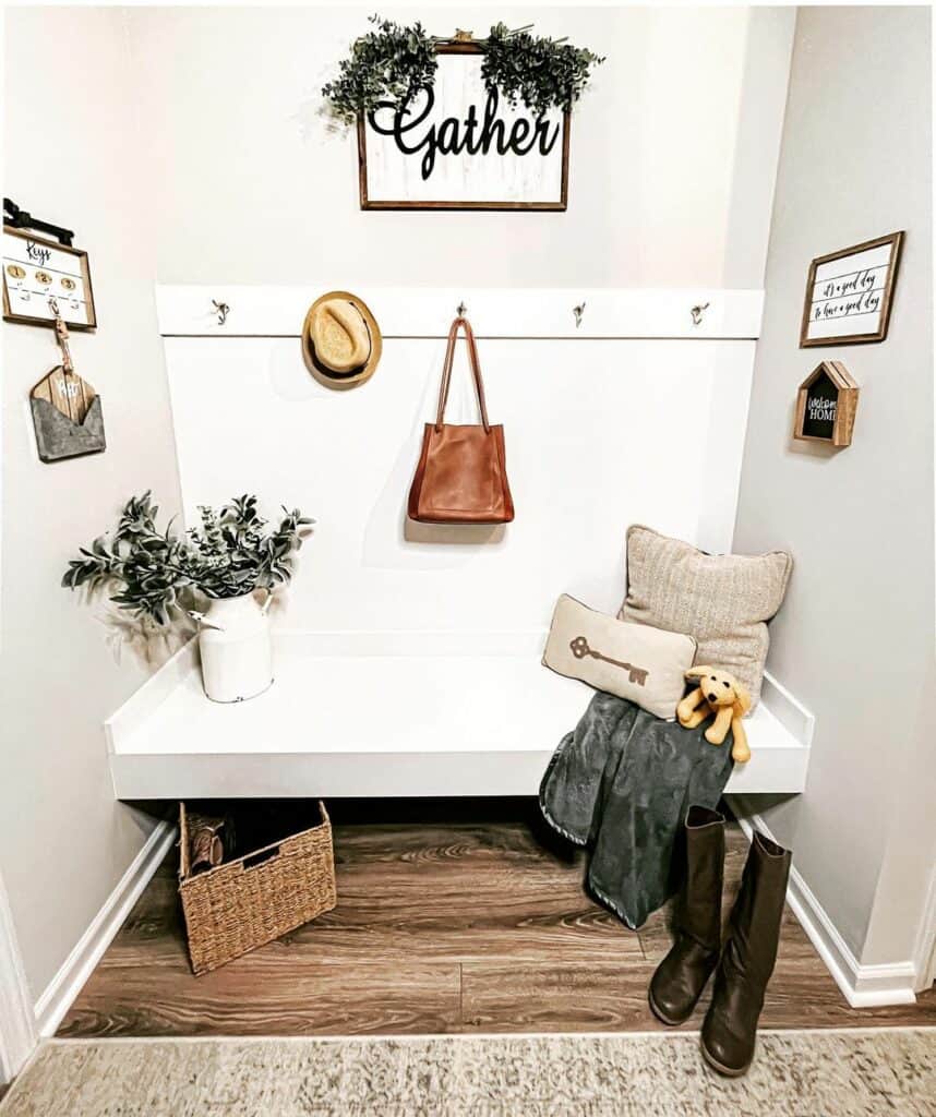 Entry Mudroom With White Floating Bench