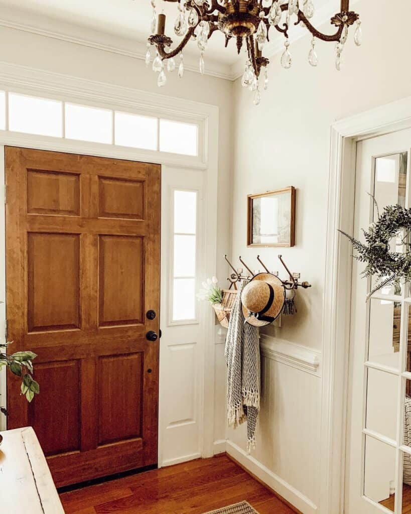 Entryway With White Wainscoting