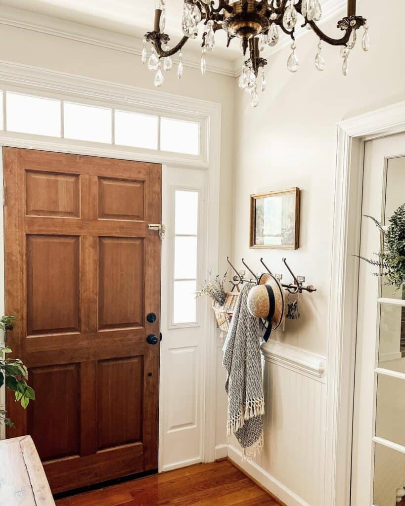 Entryway With a Traditional Glass Chandelier