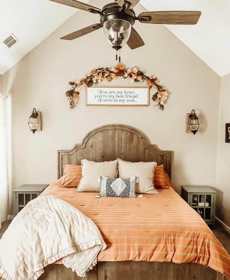 Fall Wreath Over Rust-colored Comforter
