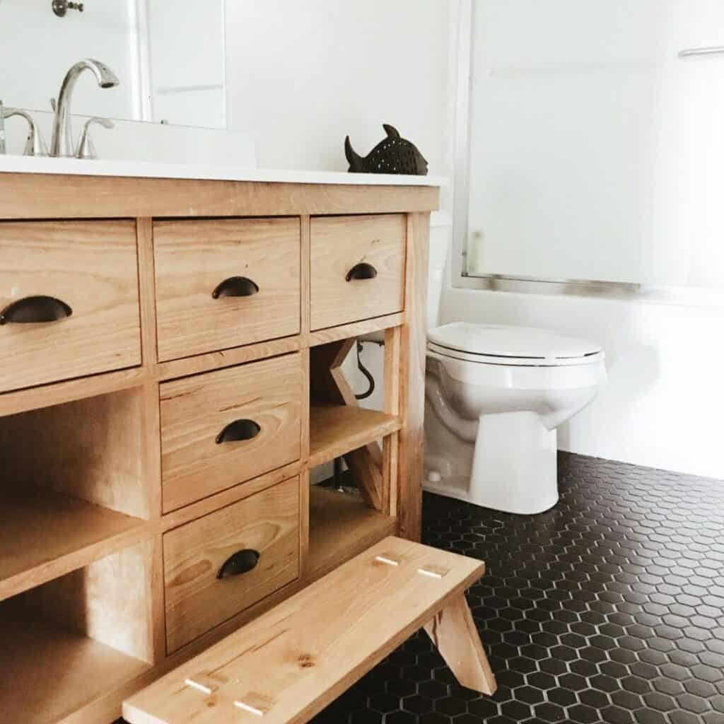 Farmhouse Bathroom With Black Tiles