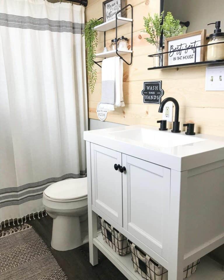 Farmhouse Bathroom With Light Wood Shiplap Wall