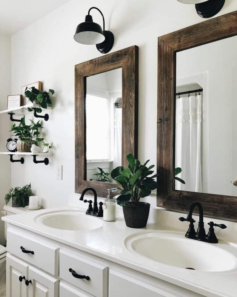 Farmhouse Bathroom With Wood-framed Mirrors