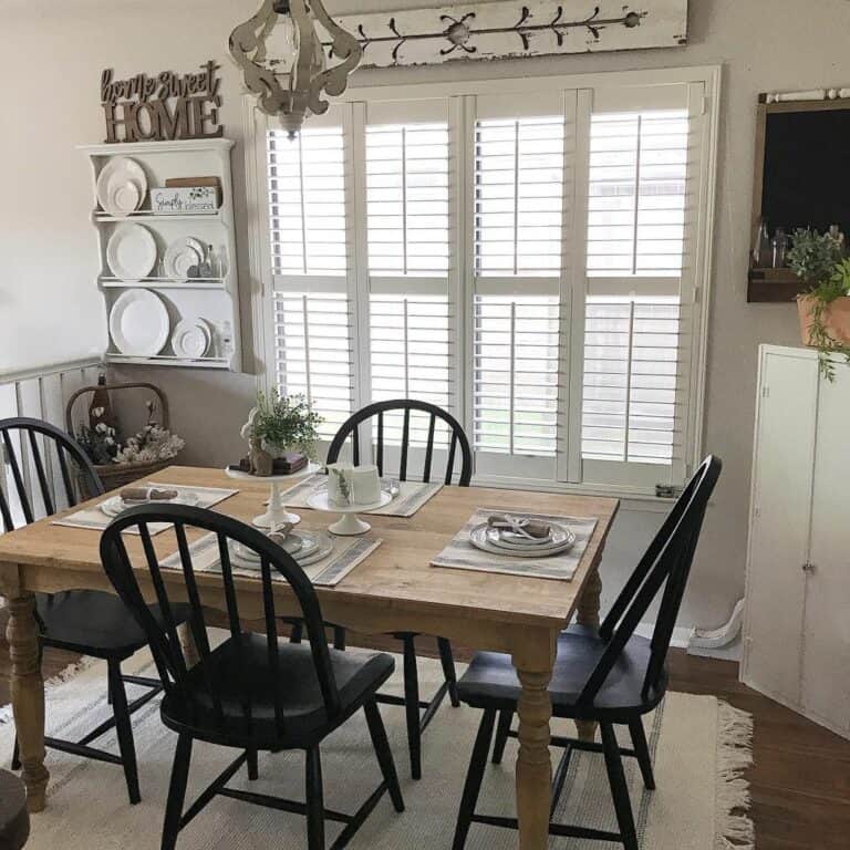 Farmhouse Dining Room With Plantation Shutters