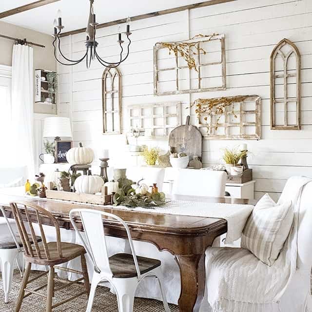 Farmhouse Dining Room With Rustic Window Frame Wall Décor
