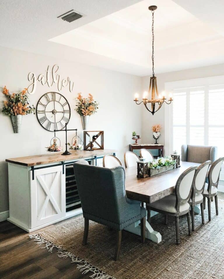 Farmhouse Dining Room With White Sideboard