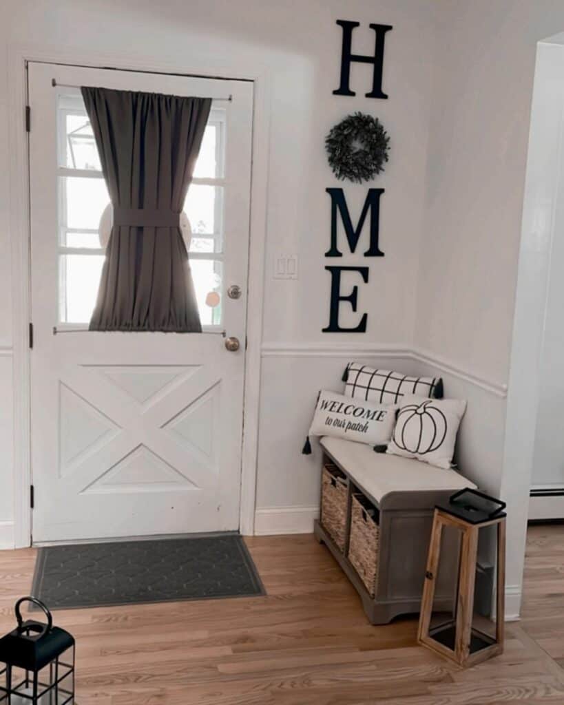 Farmhouse Entry With Gray Door Mat