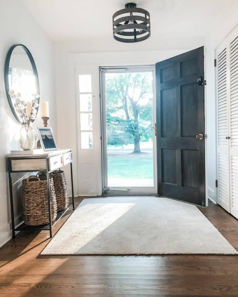 Farmhouse Foyer With Shutter-style Closet Doors