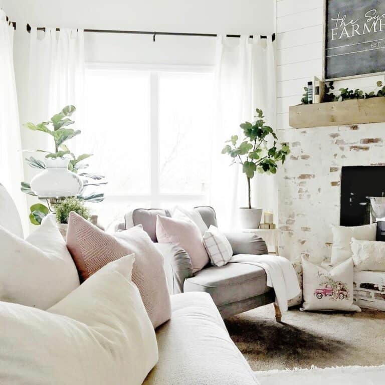 Farmhouse Fresh Living Room With Painted Brick Fireplace