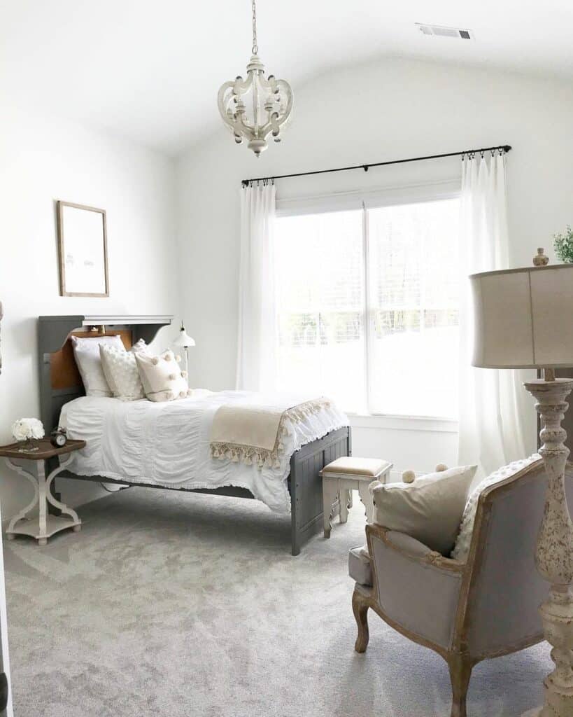 Farmhouse Guest Bedroom With Seating Area