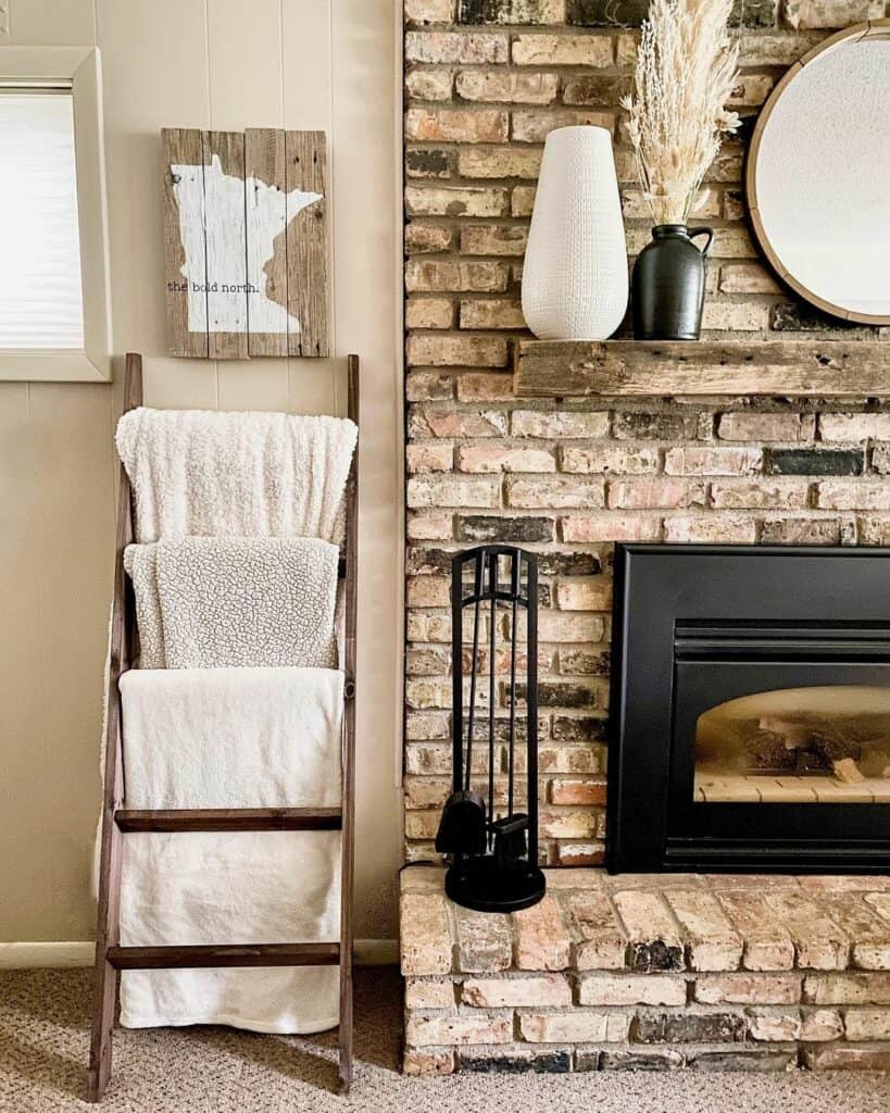 Farmhouse Living Room With Brick Fireplace