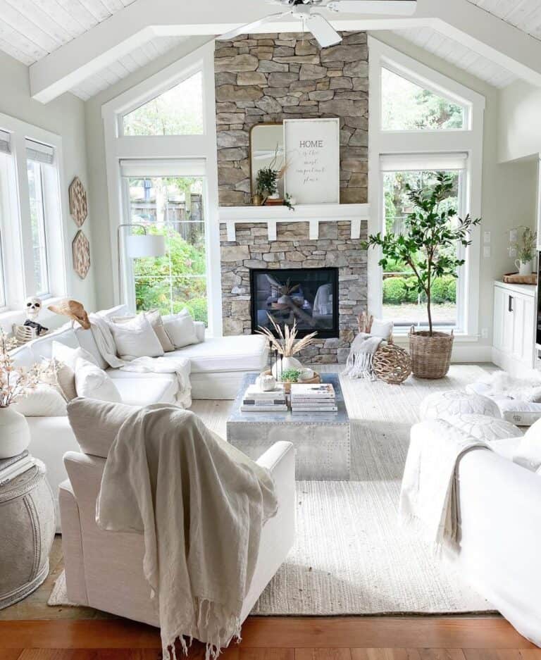 Flagstone Fireplace Between Floor-to-Ceiling Windows