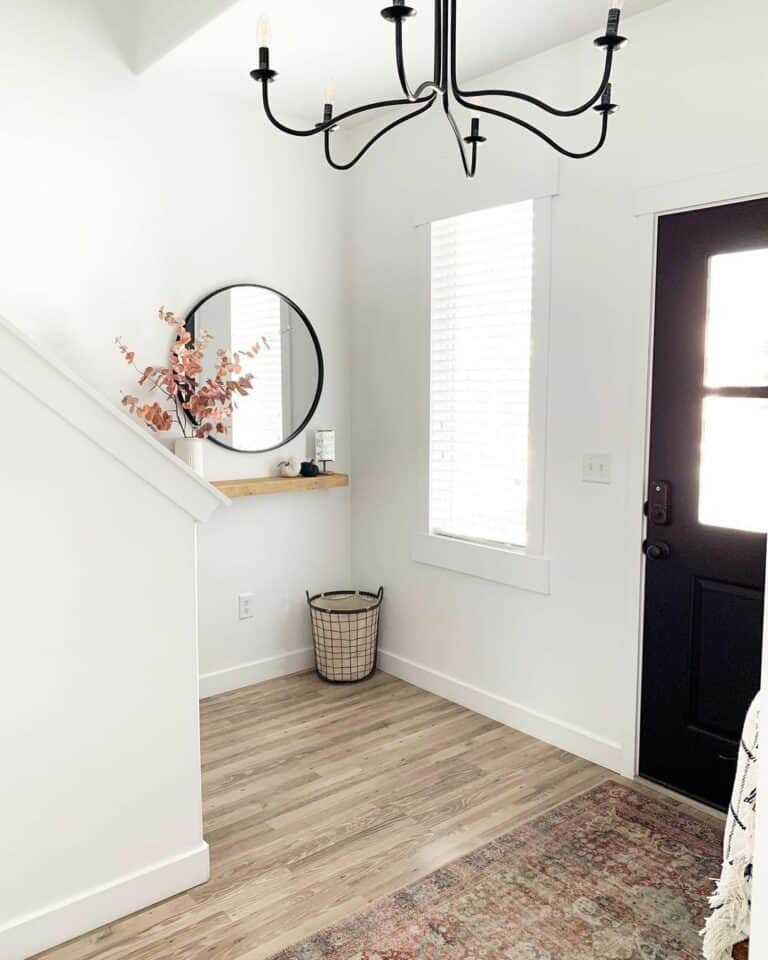 Foyer With Black Chandelier Light Fixture