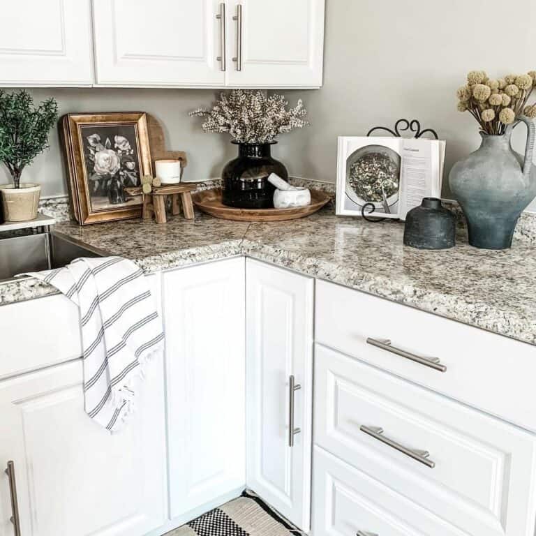 https://www.soulandlane.com/wp-content/uploads/2023/03/Gold-and-Gray-Kitchen-Countertop-Decor-768x768.jpg