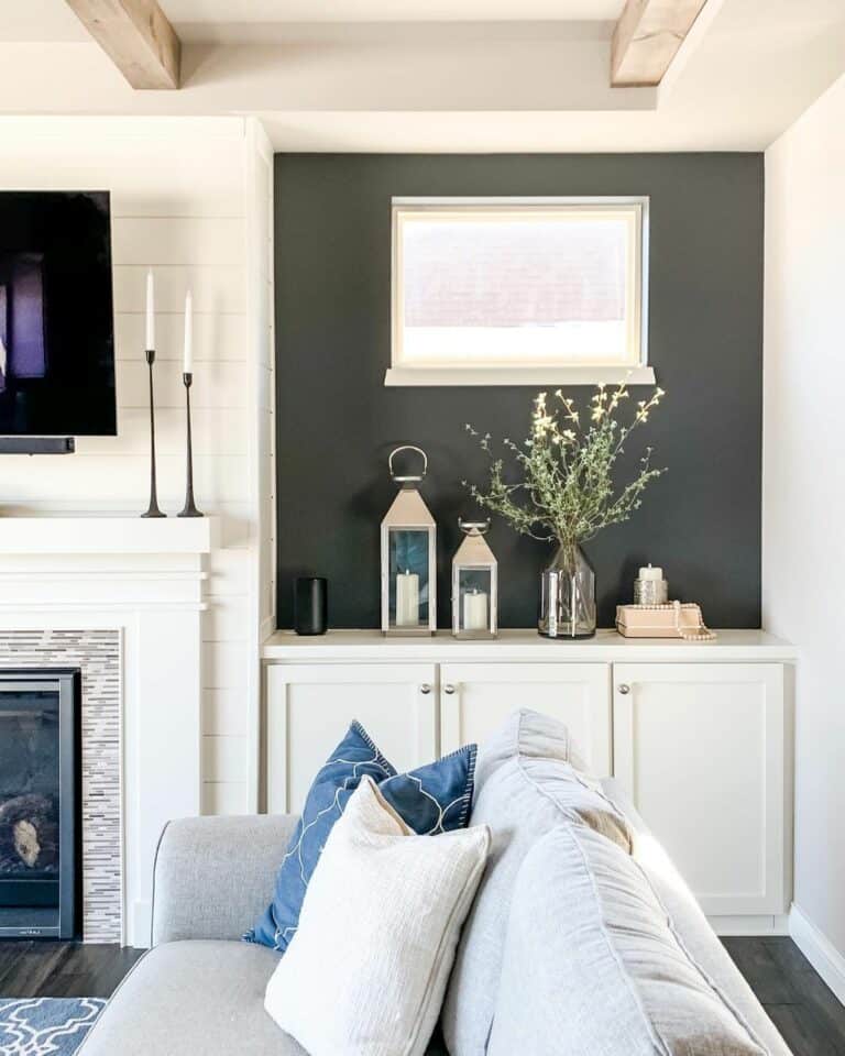 Gray Accent Wall With Blue and Lanterns