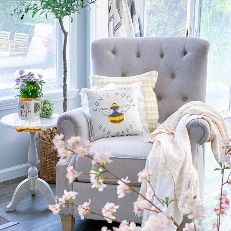 Gray Chair Hosts Yellow and White Accessories