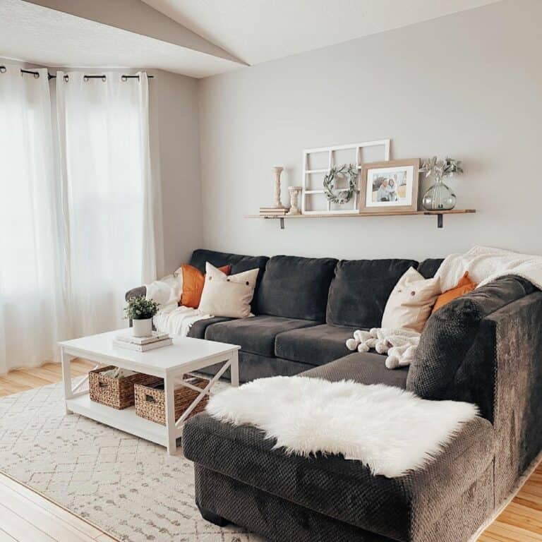 Gray Living Room With White and Orange Accents