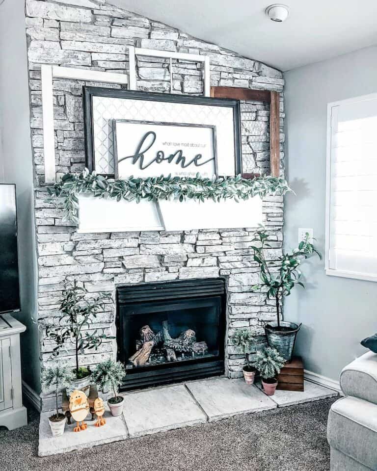Gray Stone Summer Fireplace With Greenery Décor