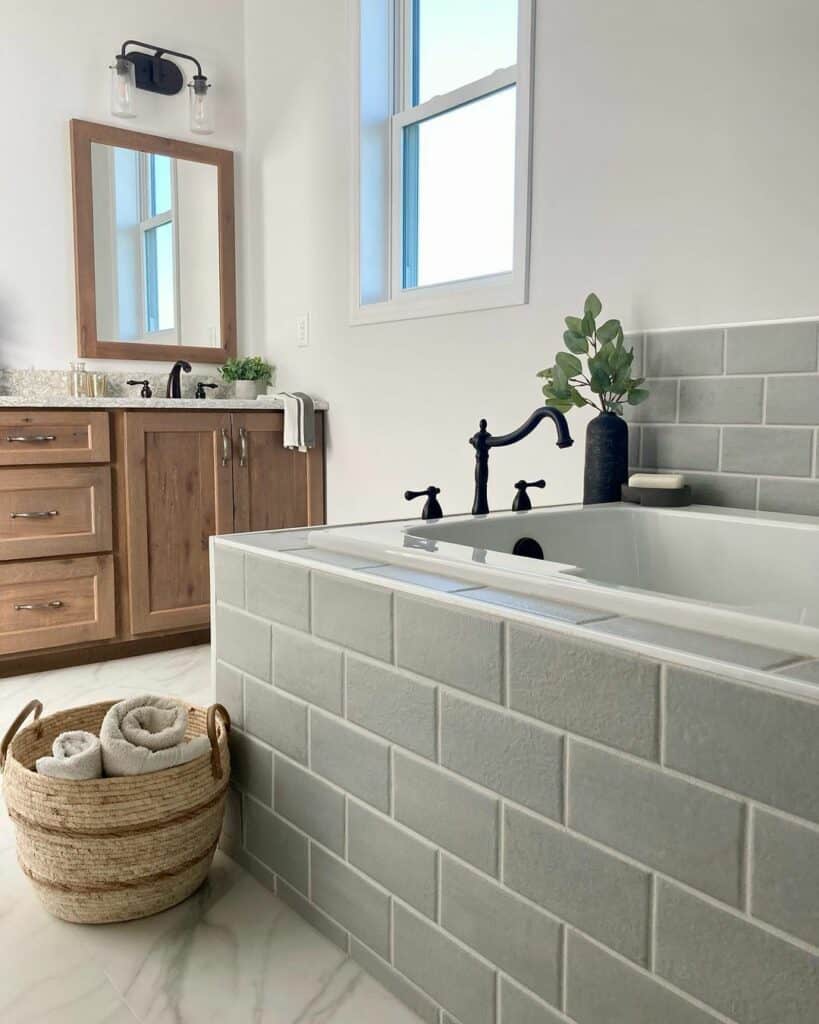 Gray Tiled Tub With Natural Décor