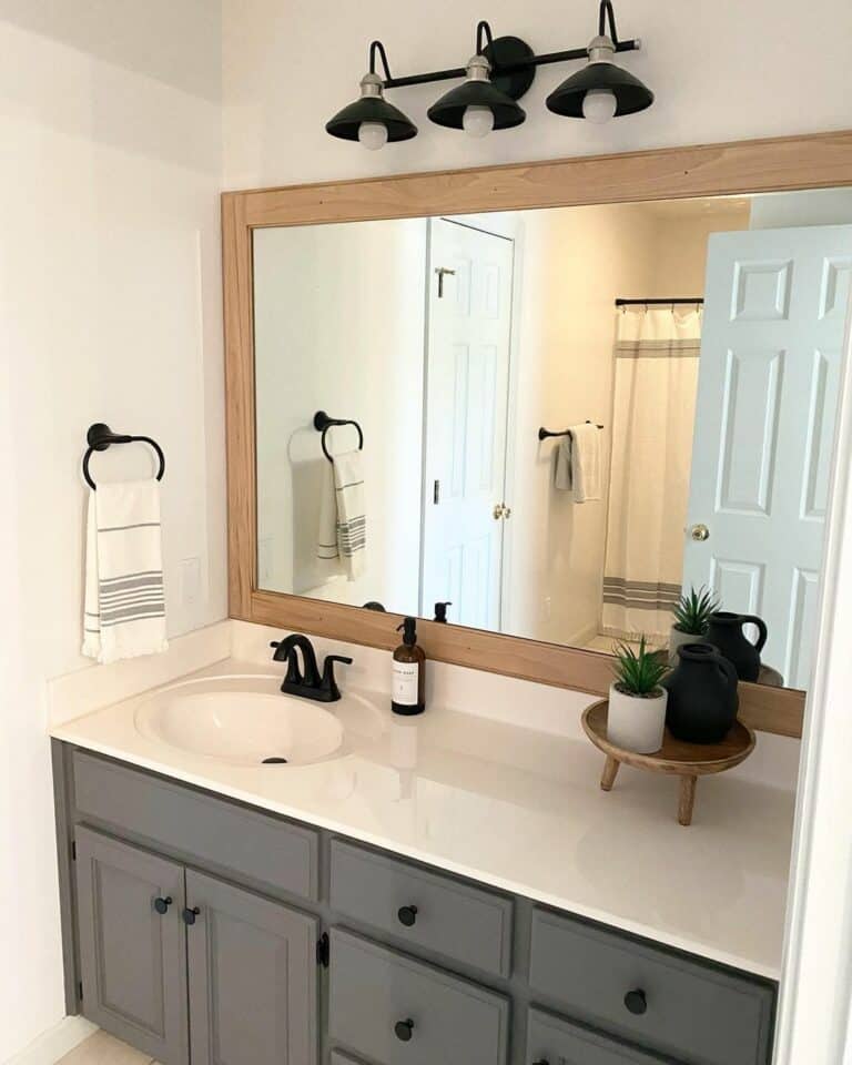 Gray Vanity With Wood-Framed Mirror