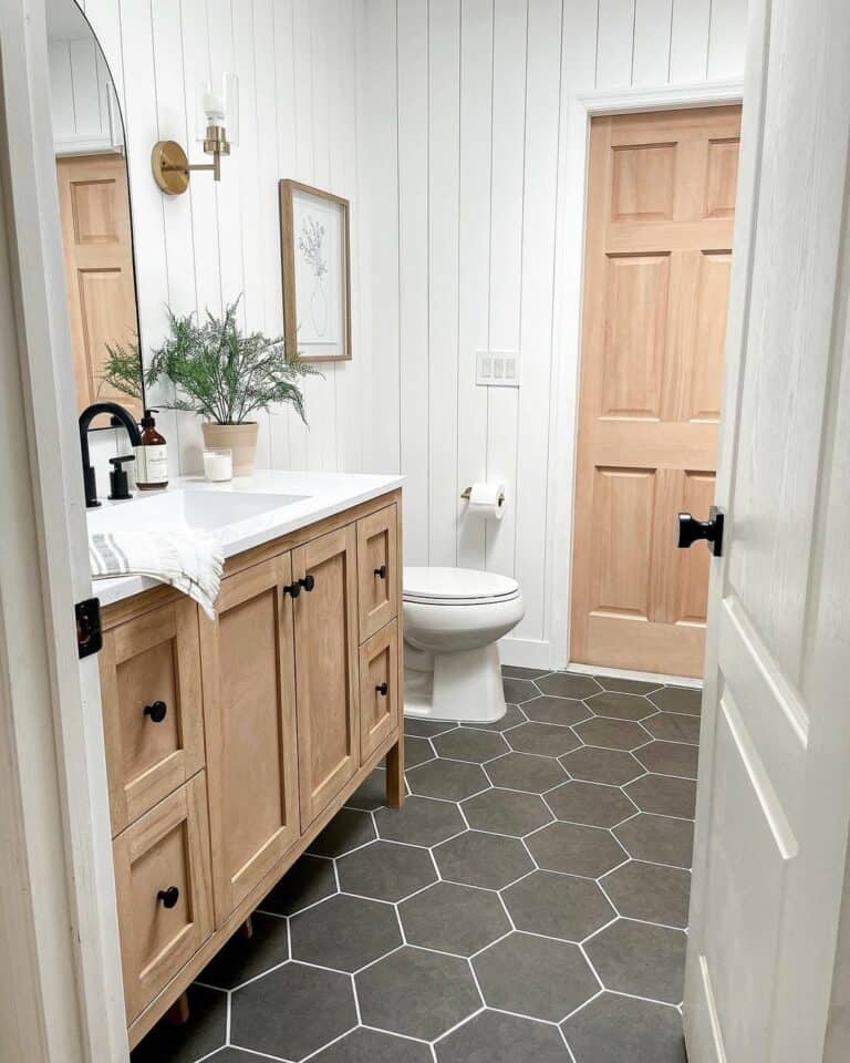 Guest Bathroom With Black Hexagonal Flooring