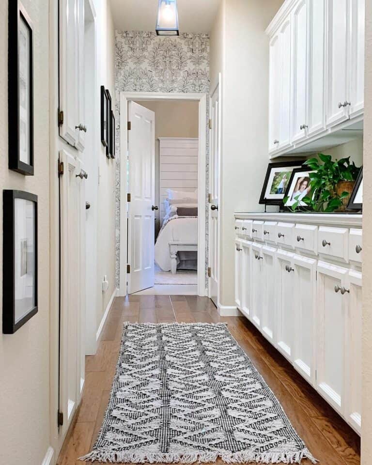 Hallway With White Cabinets and Black Details