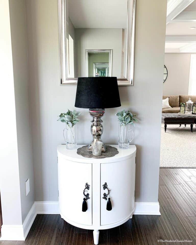 Hallway With an Eye-catching White Cabinet