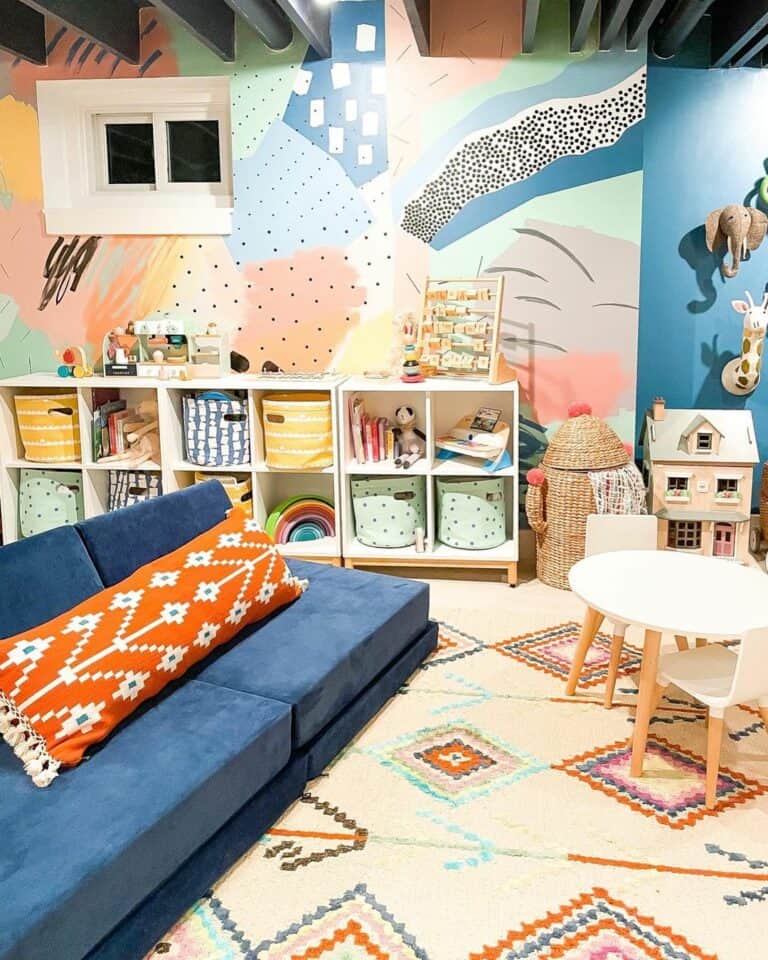 Kids Basement Playroom With Blue Sofa